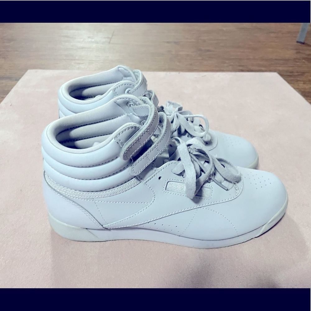 Ice blue Reebok Freestyle Hi-tops